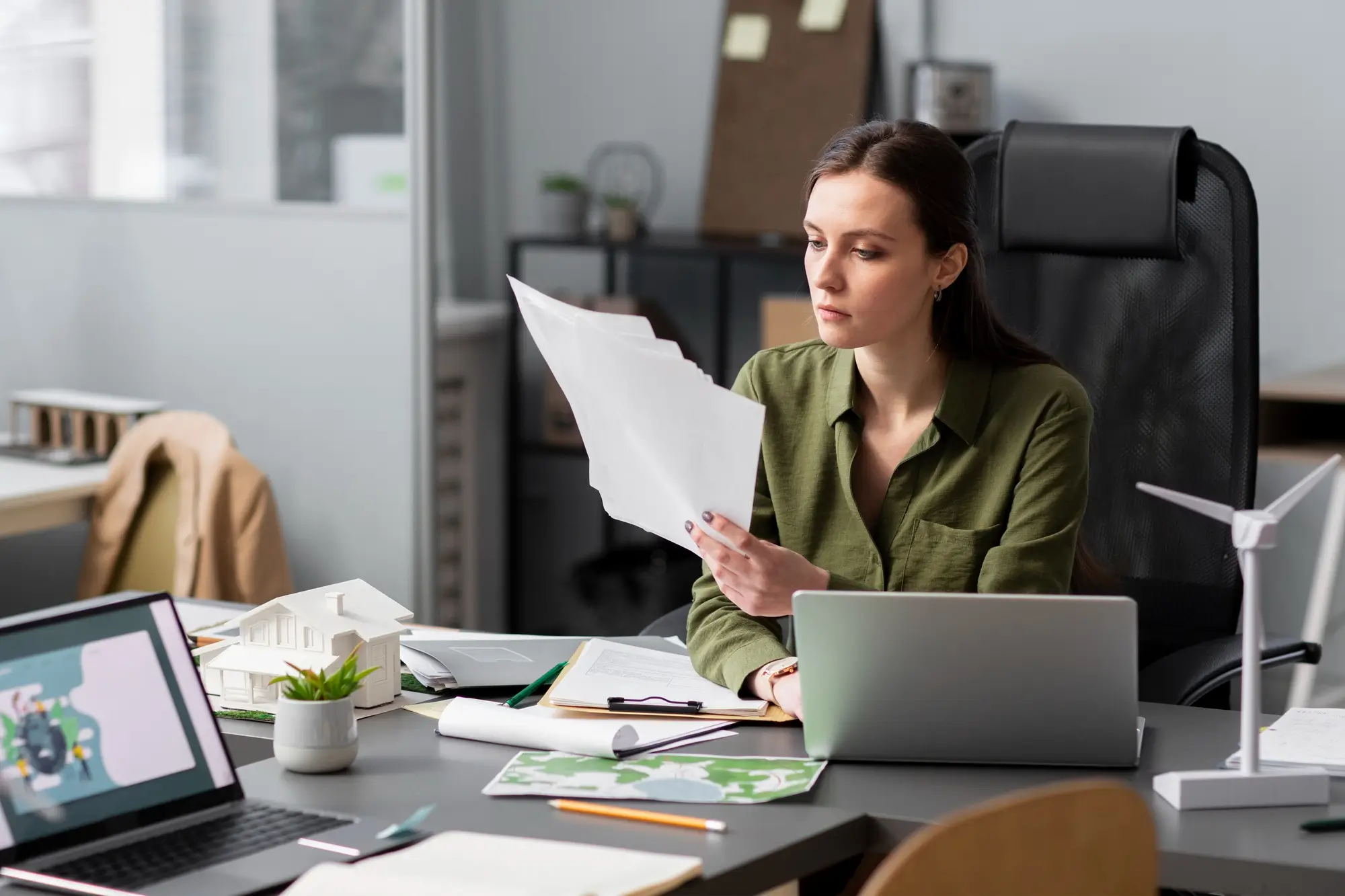 Marketing specialist reviewing a real estate advertising campaign