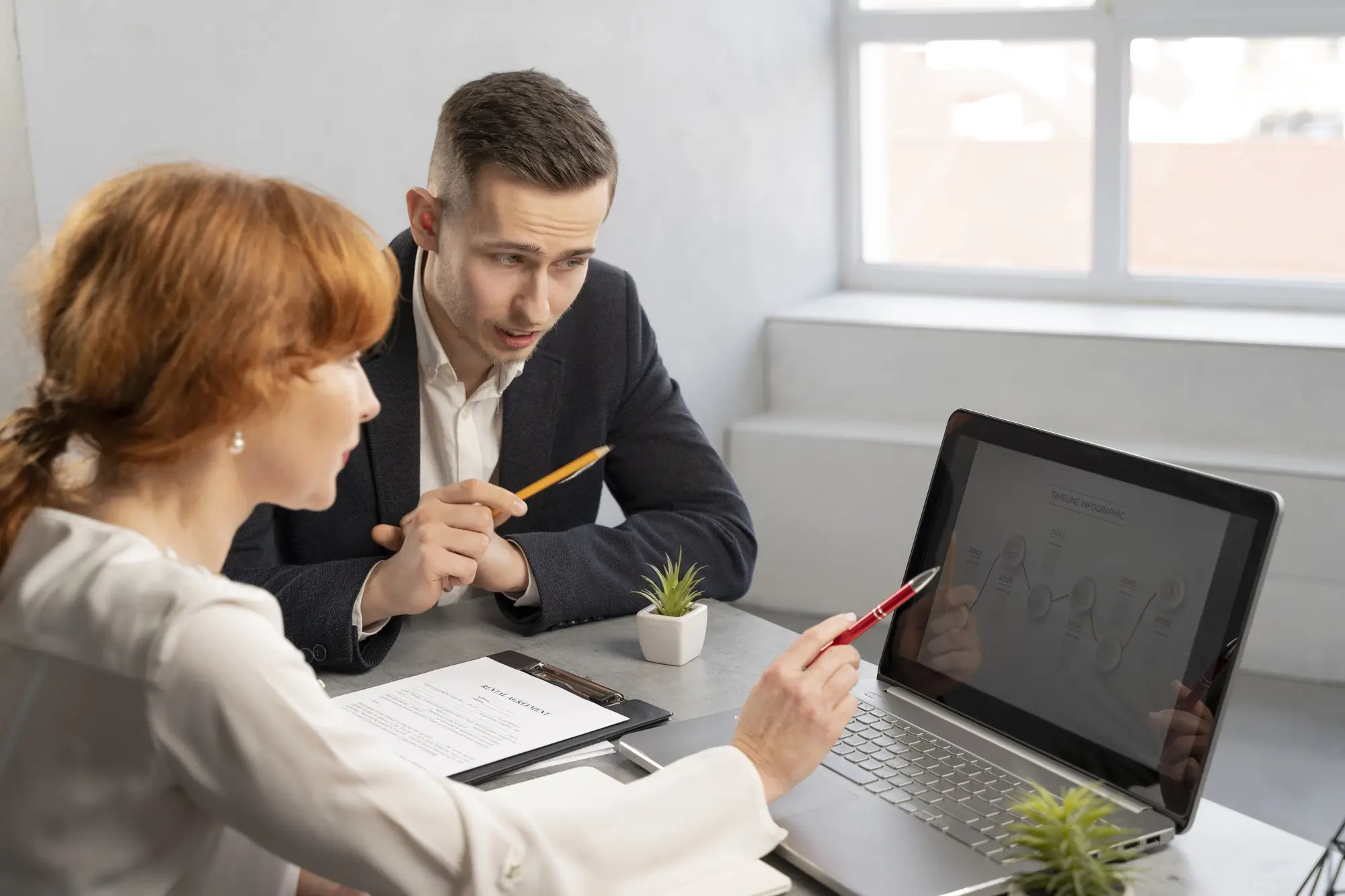 Real estate inquiry form displayed on a laptop